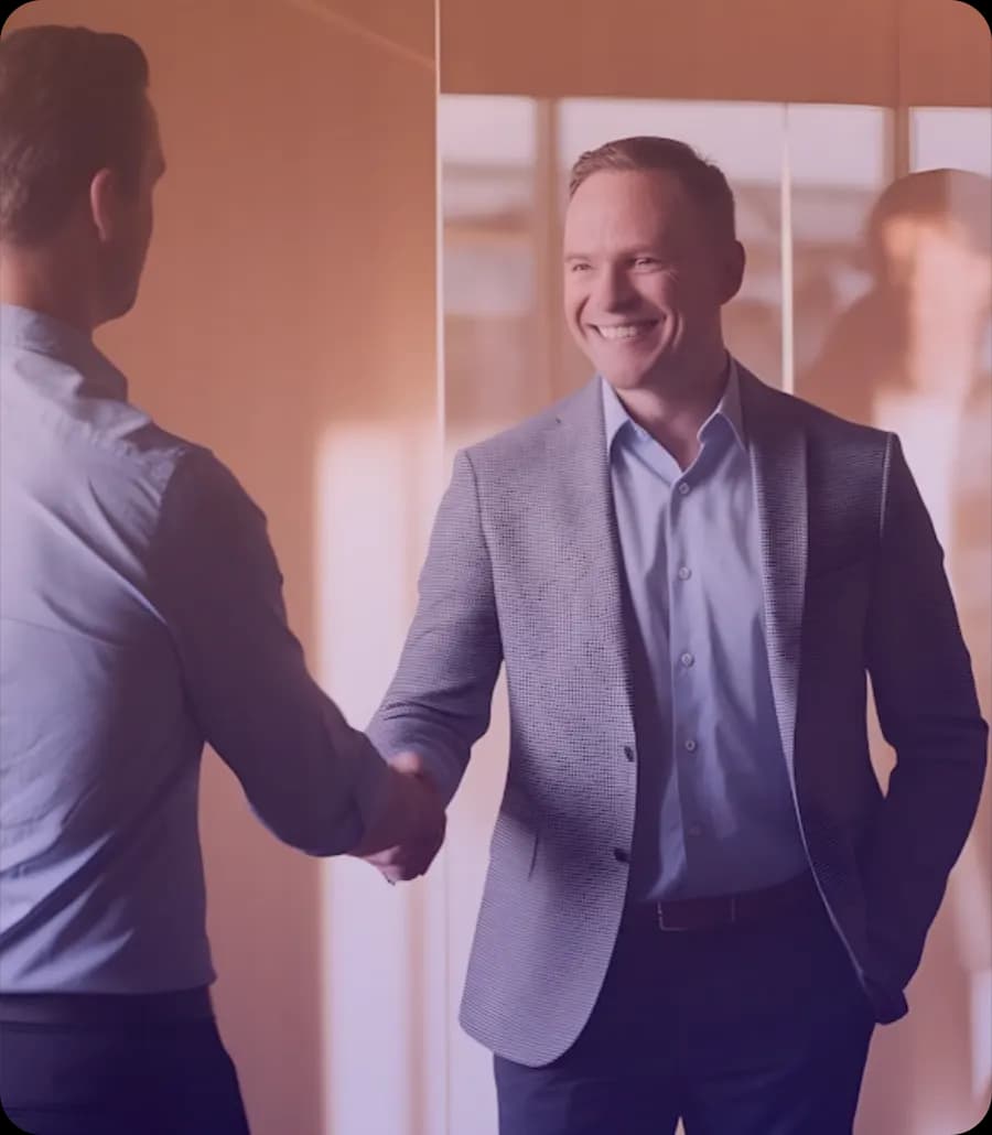 Two business partners shaking hands